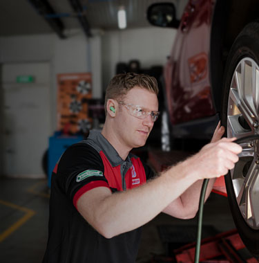 How to check your tyre pressure? Learn about tyre pressure. Image of tyre checking.