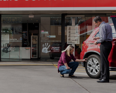 Understanding tyre sizes. Learn about your tyre size & how to check it. Image of checking a tyre.