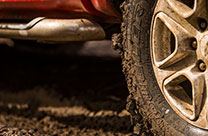 Mud terrain tyres, explore the best range of mud terrain tyres. Image of 4WD driving. Explore the best range of mud terrain tyres with the Dueler pattern. Image of Dueler tyre driving in mud.