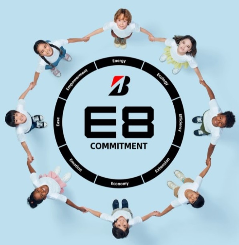 e8-kids-standing-together-around-bridgestones-commitments-to-the-future